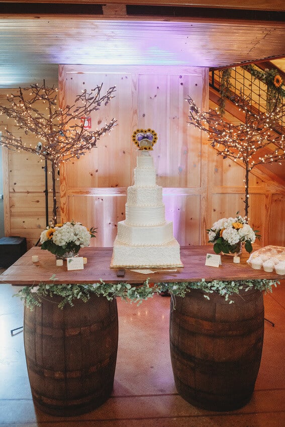 wedding cake on barrel table